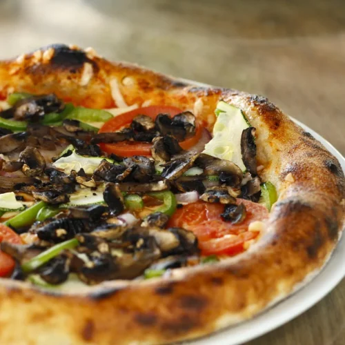 Deliciosas pizzas artesanales estilo italianas en Playa del Carmen
