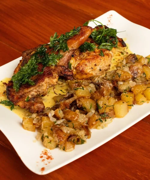pollo a la leña en la casa de la mantarraya